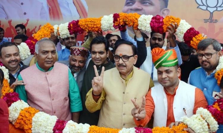 bjp state president dr. mahendra nath pandey and new bjp youth president subhash yadav