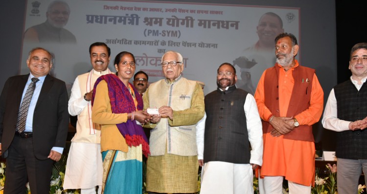 governor distributed registration membership cards to beneficiaries